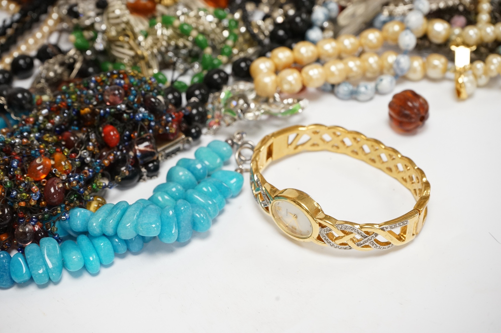 A quantity of assorted costume jewellery. Condition - poor to fair